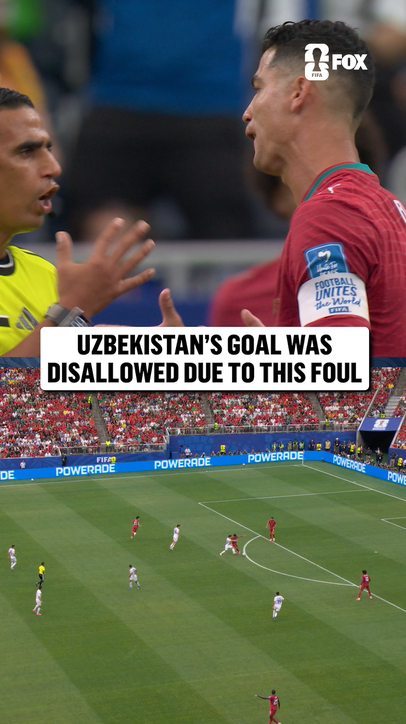 After VAR review, the Uzbekistan goal is disallowed because of a foul in the build-up
