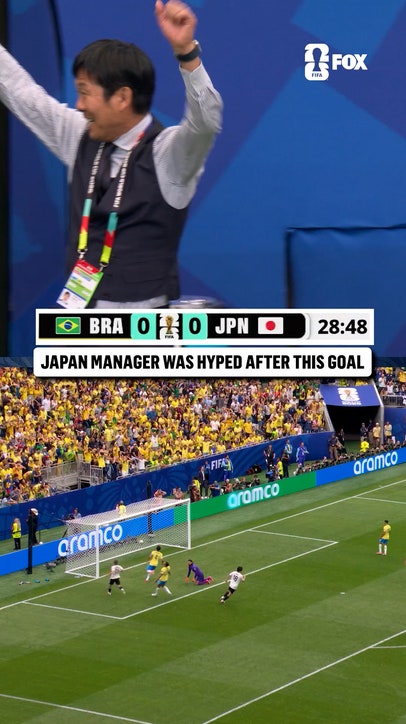 Japan manager Hajime Moriyasu celebrates his team taking the lead over Brazil in the Round of 32 🇯🇵