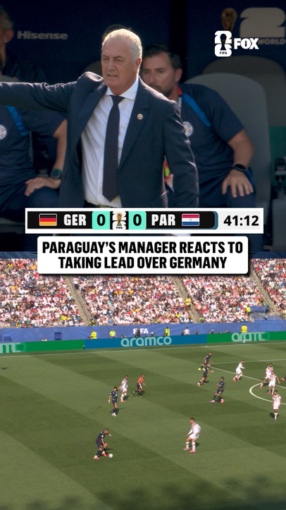 Paraguay manager Gustavo Alfaro maintains his composure after his team took a 1-0 lead over Germany