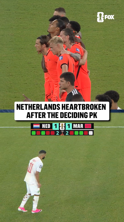 Netherlands players react to Morocco's winning penalty