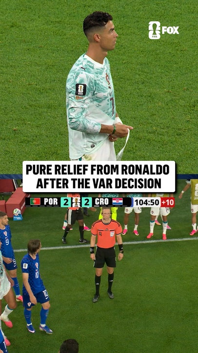 Ronaldo and Portugal players react to the offside call that kept them in the lead in stoppage time