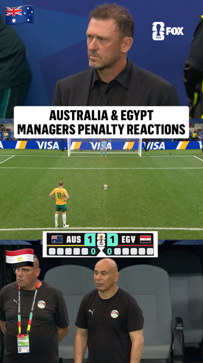 Australia's Tony Popovic and Egypt's Hossam Hassan watch their teams in PKs