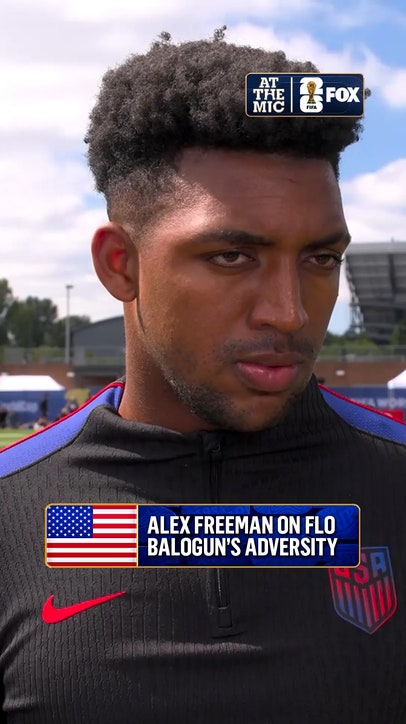 USA defender Alex Freeman speaks with Jenny Taft upon Balogun's return