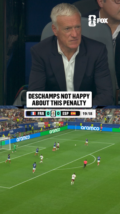 Didier Deschamps reacts to his team conceding a penalty and falling behind 1-0 to Spain