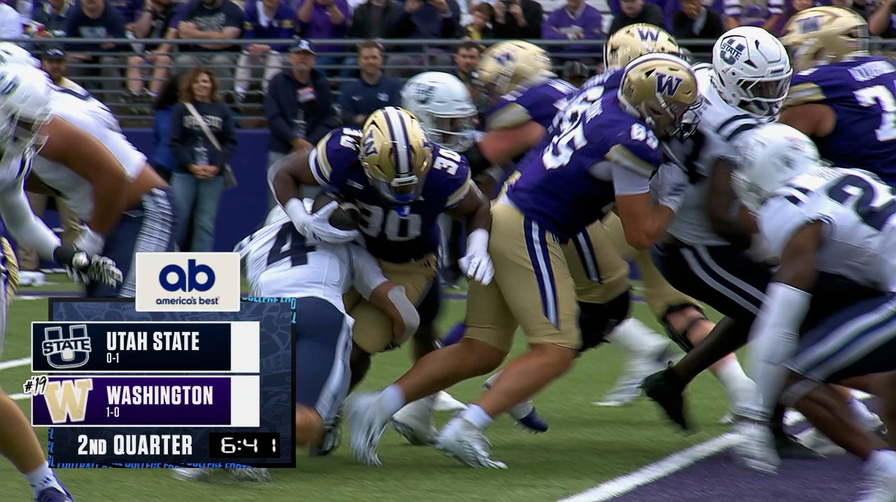 Washington's Ansu Sanoe rushes for a 1-yard TD, retaking the lead against Utah State