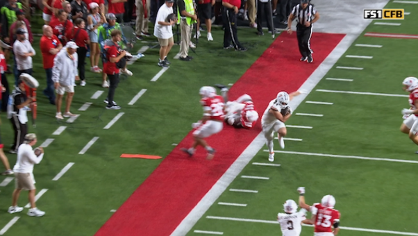 Bowling Green's Leo Kemp runs down the sideline for a 19-yard TD, cutting Nebraska's lead to 28