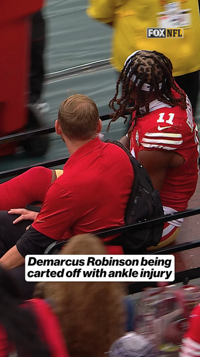 Demarcus Robinson being carted off with ankle injury
