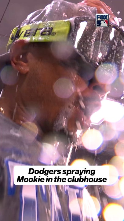 Mookie Betts livin' it up after the Dodgers beat the Braves in the NLDS 🍾