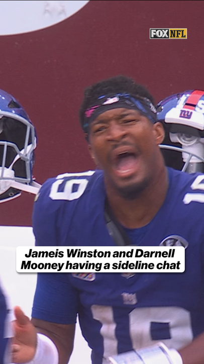 Jameis Winston and Darnell Mooney share an animated exchange on the Giants sideline