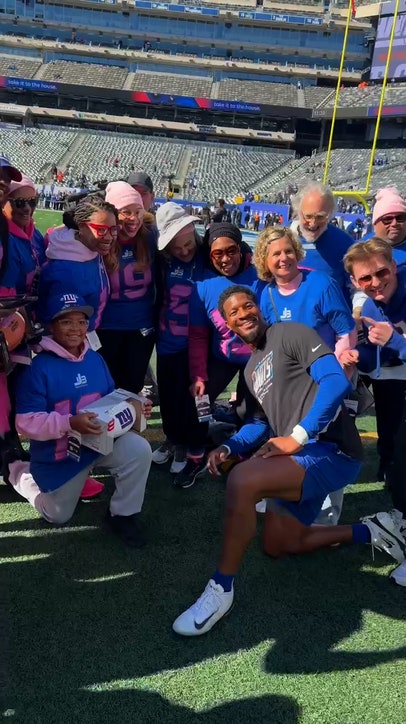 Jameis Winston takes photos with fans after surprising them with Super Bowl tickets