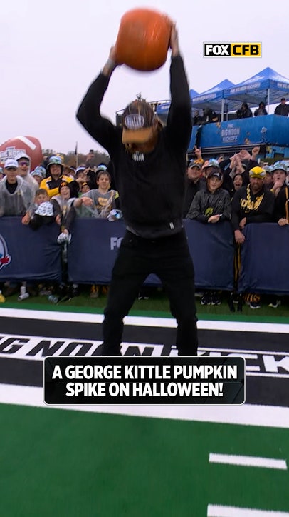 George Kittle smashes a Wisconsin pumpkin