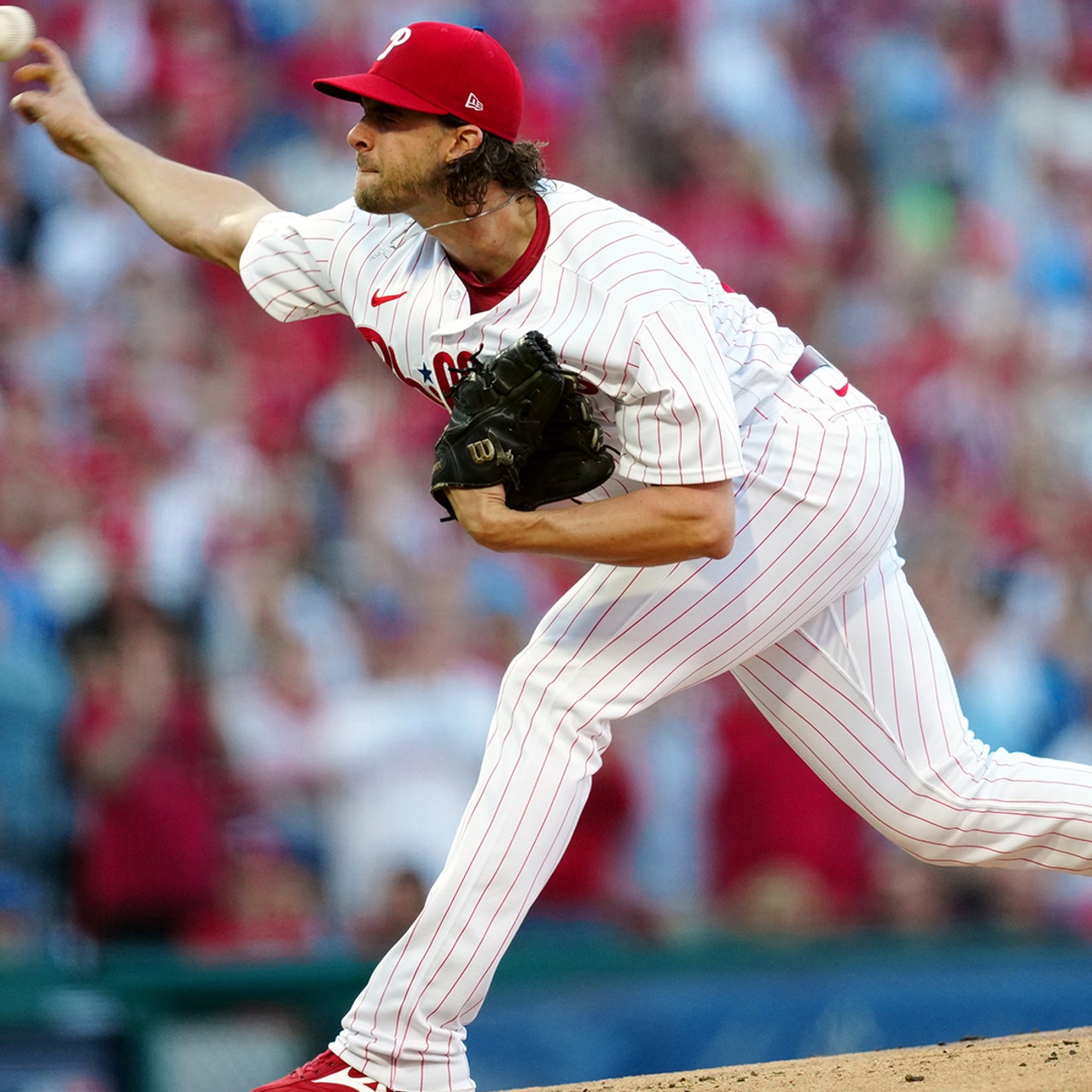 Phillies' pitcher takes over MLB wins lead in victory against