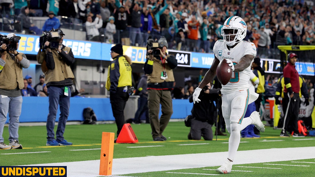 Tyreek Hill of the Miami Dolphins celebrates a touchdown catch