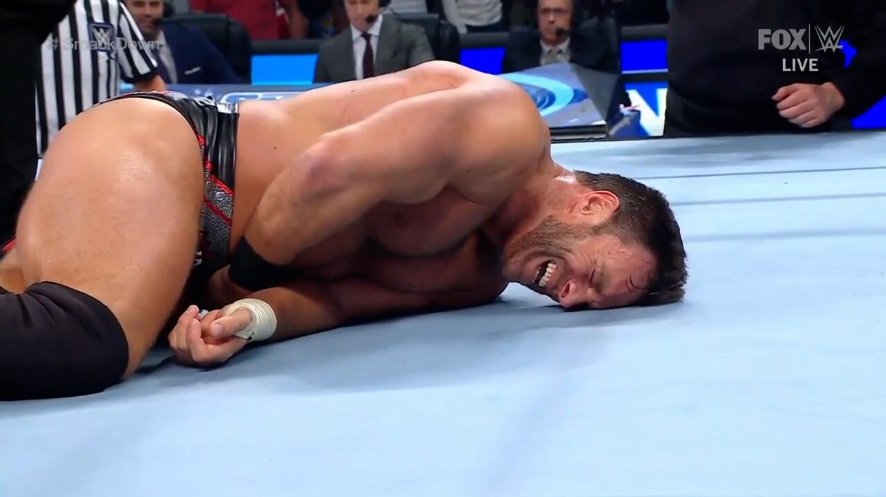 LA Knight speared by Roman Reigns after pinning Solo Sikoa on SmackDown Season Premiere 