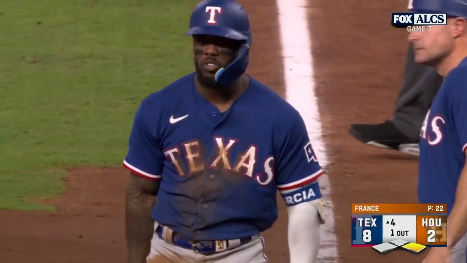 Evan Carter and Adolis Garcia both hit two-run singles to extend the Rangers' lead over the Astros.