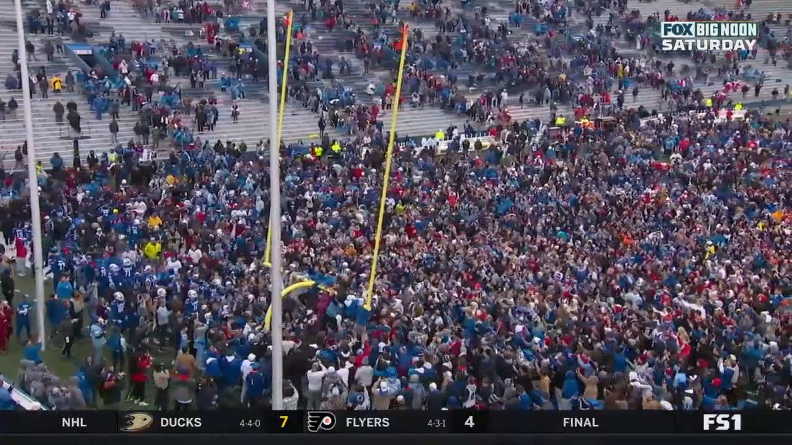 Kansas Fans rush Memorial Stadium after the Jayhawks' shocking upset over No. 6 Oklahoma