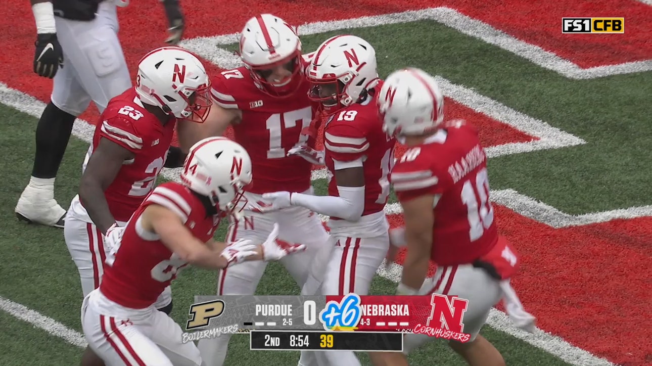 Nebraska's Heinrich Haarberg connects on a deep ball to Jaylen Lloyd for a 73-yard TD to take a 14-0 lead over Purdue