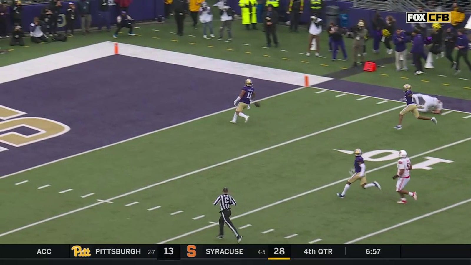  Washington's Alphonzo Tuputala gets an interception but drops the ball one yard shy of the endzone, resulting in Huskies forcing a Utah safety