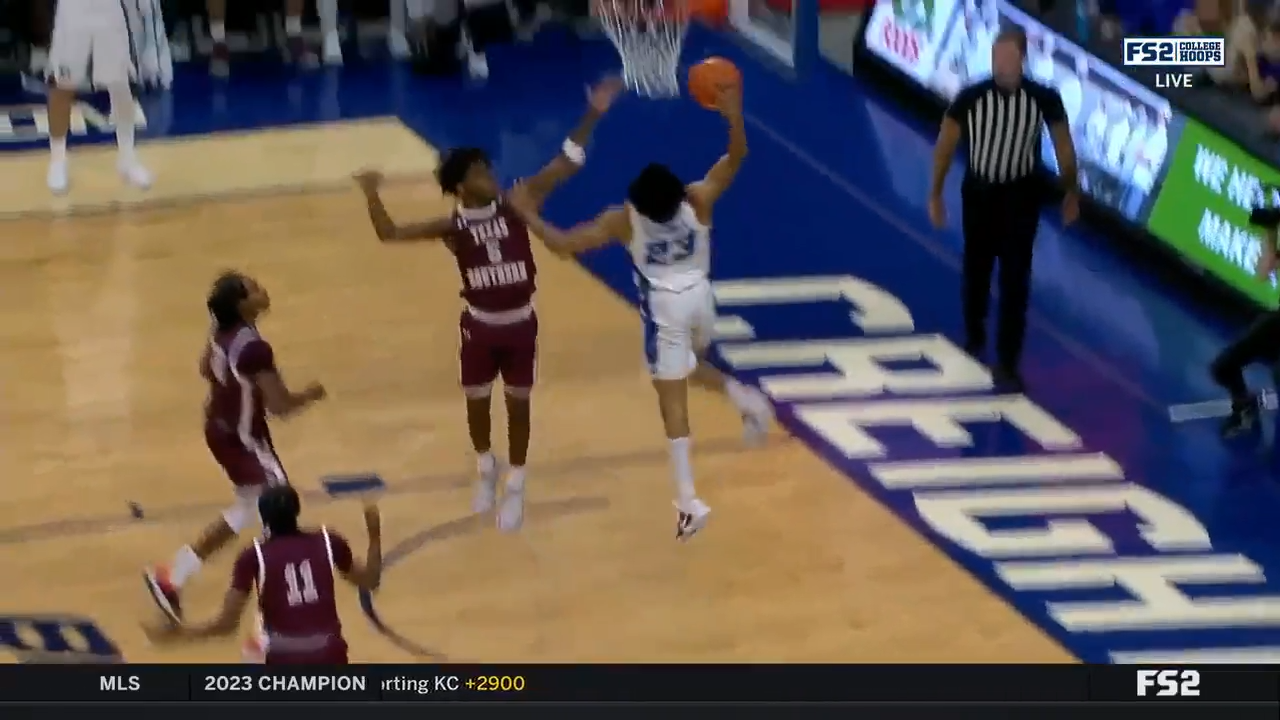 Creighton's Trey Alexander drives past Texas Southern's defense to throw down a NASTY jam