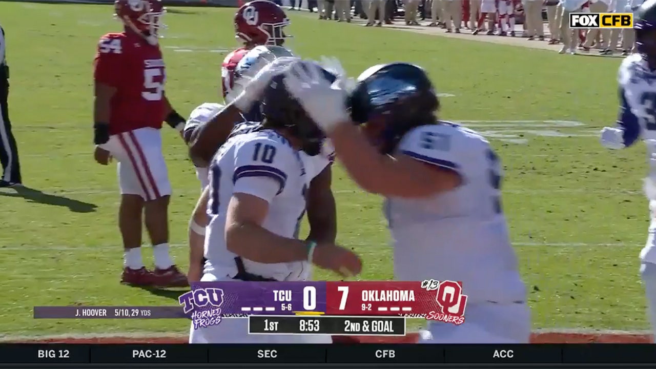 After a muffed punt by Oklahoma, TCU's Josh Hoover keeps it and takes it three yards for a TD