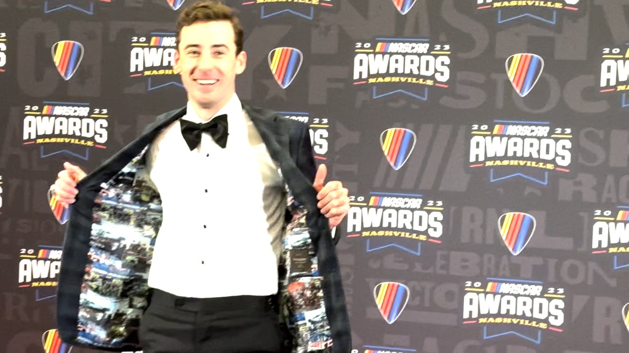 Ryan Blaney shows off the jacket by friend 'Stitched by Mitch', who put photos of his wins inside his suit jacket