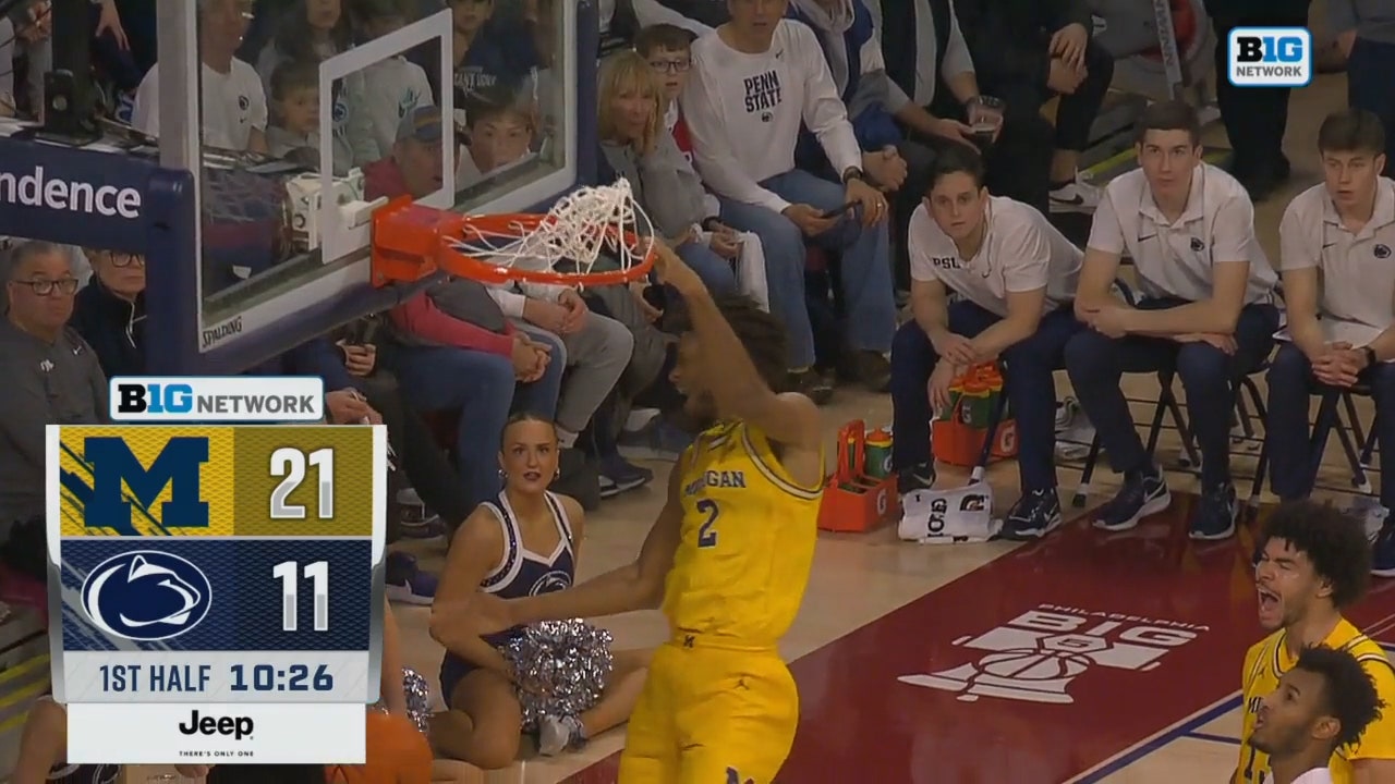 Michigan's Tray Jackson rises for a MONSTER one-handed slam vs. Penn State
