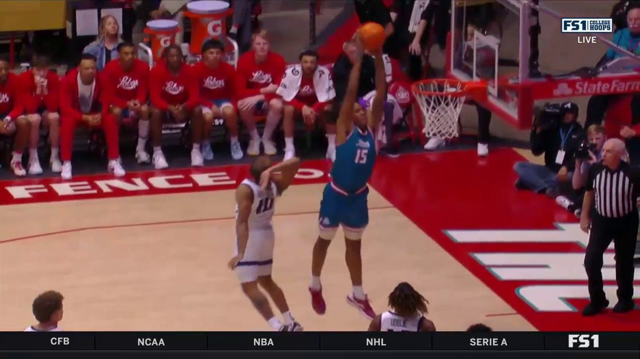 JT Toppin throws down a monster two-handed slam to help New Mexico defeat Utah State, 99-86