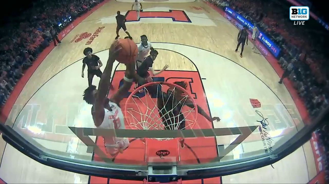 Quincy Guerrier gets up for a putback jam to extend Illinois' lead over Rutgers
