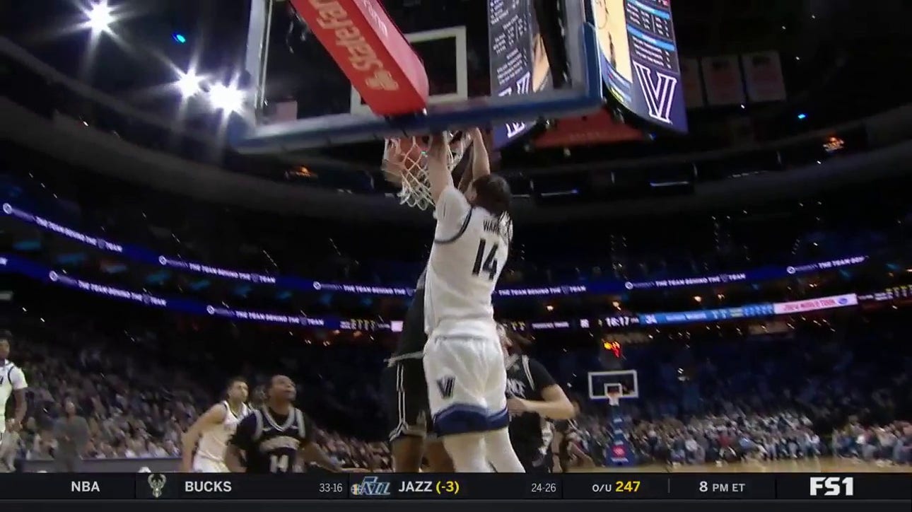 Lance Ware throws down a two-handed slam to extend Villanova's lead over Providence