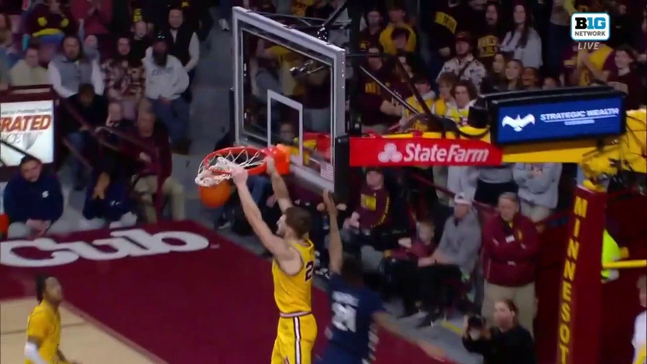 Minnesota's Parker Fox throws down a fast-break dunk to shrink Penn State's lead