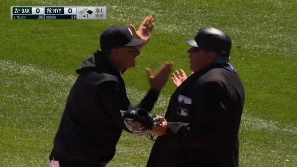 Yankees manager Aaron Boone gets mistakenly ejected after a fan yells at the umpire