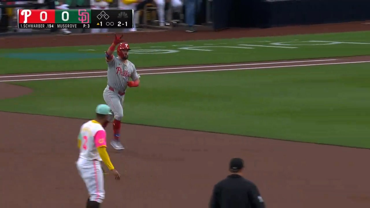 Phillies' Kyle Schwarber crushes a solo home run, his 100th home run with Philadelphia, against Padres