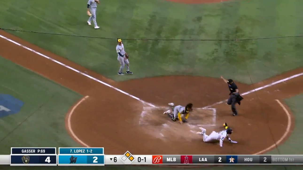 Marlins' Jazz Chisholm Jr. scores from second base on WILD bunt play vs. Brewers