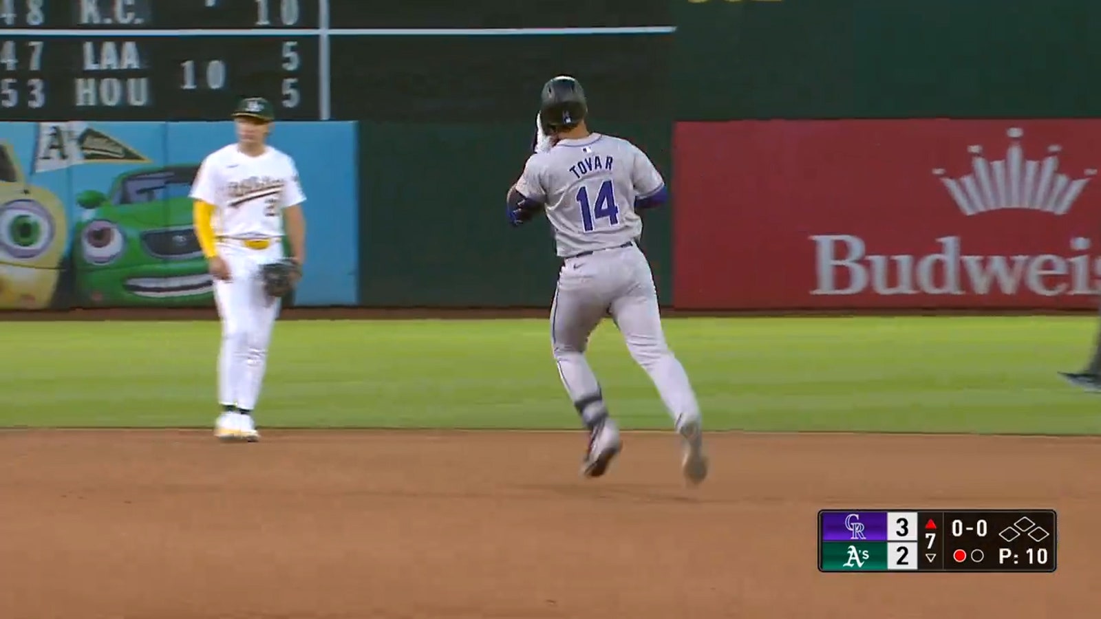 Ezequiel Tovar blasts his second home run of the game to extend the Rockies' lead over the Athletics