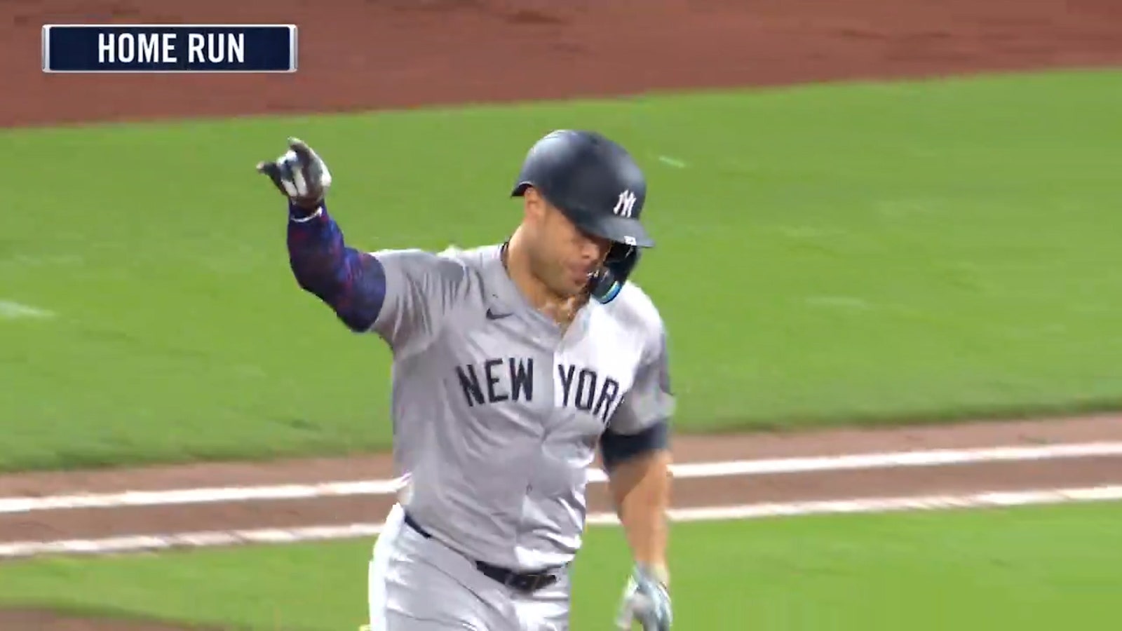 Yankees' Giancarlo Stanton crushes a two-run home run against the Giants