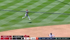 Reds' Elly De La Cruz makes a RIDICULOUS jump throw to get Jacob Stallings out at first