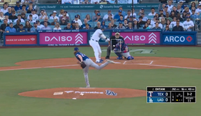 Shohei Ohtani crushes a solo home run in the first inning to give the Dodgers a 1-0 lead over the Rangers