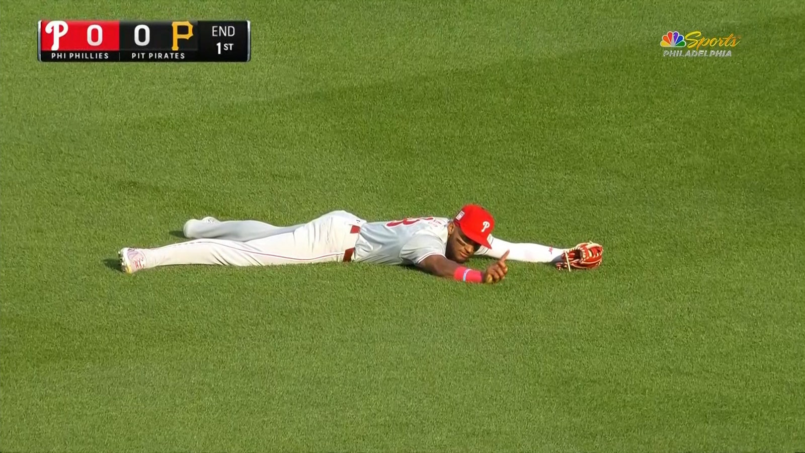 Phillies' Johan Rojas makes a diving one-handed catch to close out the first inning against Pirates