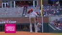 Reds' Hunter Greene makes a slick behind-the-back grab and throws out the runner against the Braves