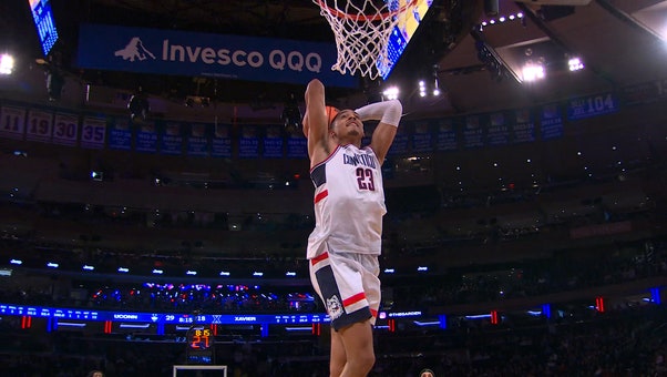 Jayden Ross gets steal and finishes dunk on fast break, extending UConn's lead over Xavier