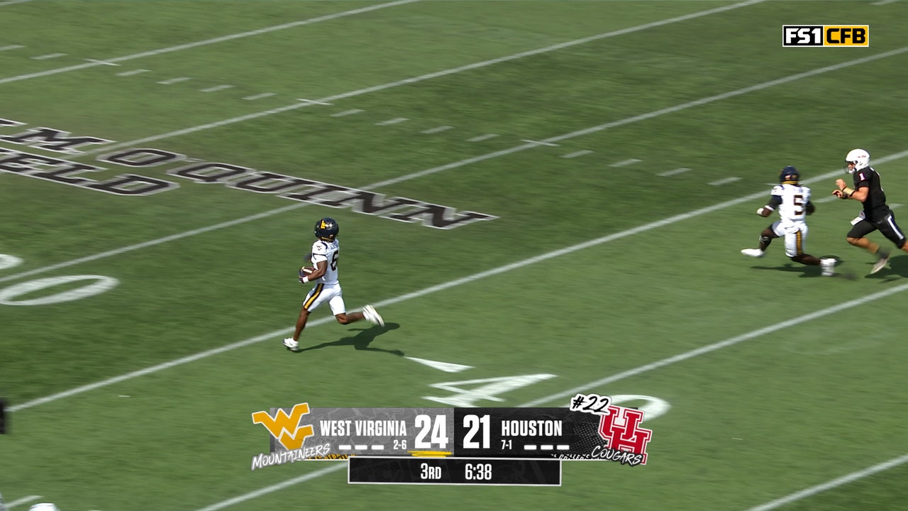 West Virginia's Jordan Scruggs returns 80-yard pick-six to extend lead over Houston