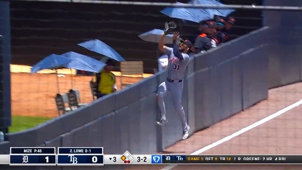 Tigers' Riley Greene makes a leaping catch over the wall vs. Rays