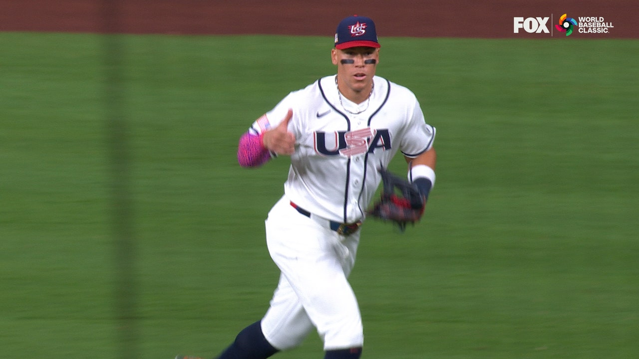 United States' Aaron Judge throws out Mexico's Joey Ortiz at third base from right field