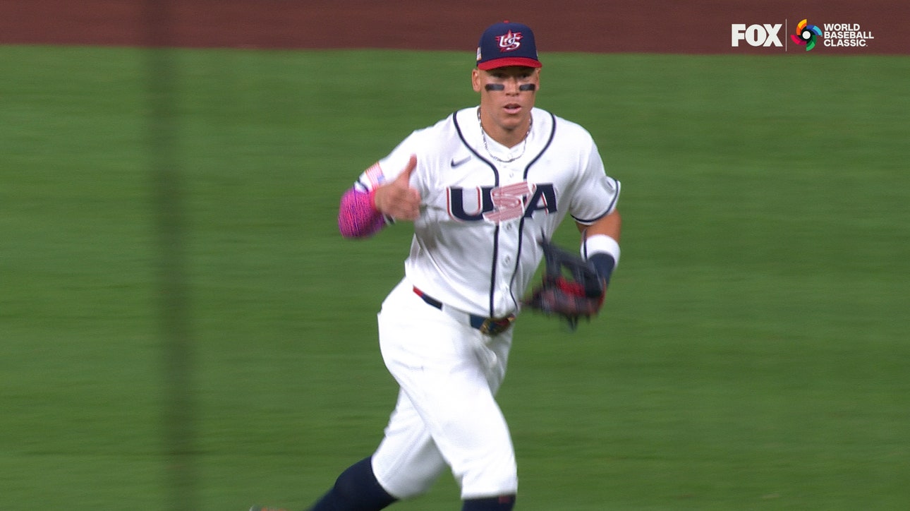 United States' Aaron Judge throws out Mexico's Joey Ortiz at third base from right field
