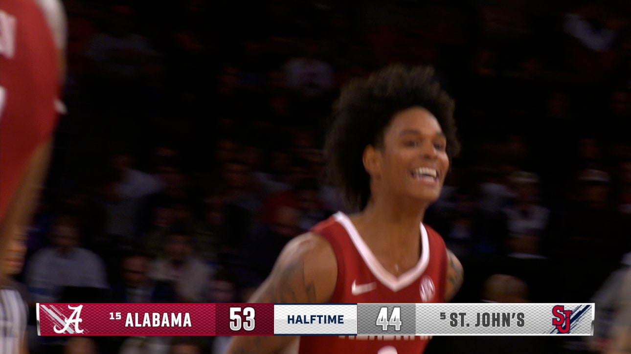 Aden Holloway hits three at the buzzer, extending Alabama's lead over St. John's 