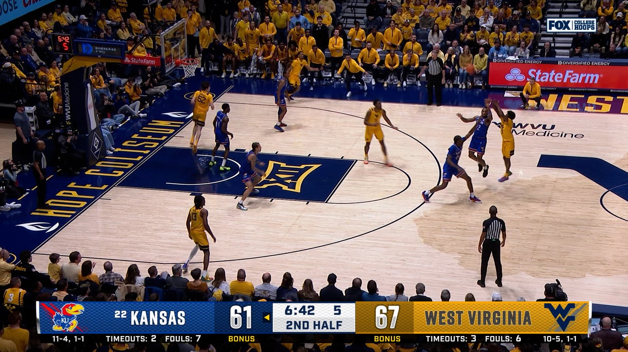 Honor Huff sinks deep 3-point, plus the foul, extending West Virginia's lead over Kansas