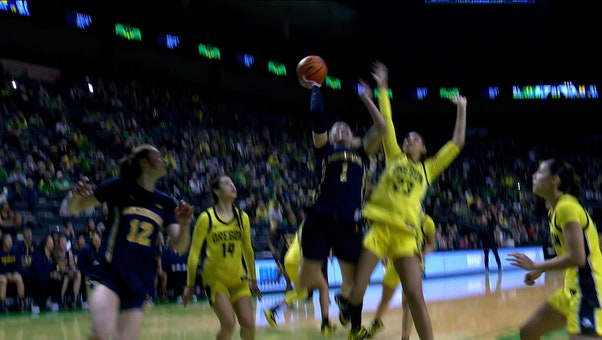 Michigan's Olivia Olson drives right for CLUTCH and-one finish, sending game to double overtime against Oregon