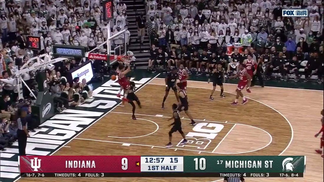 Indiana's Race Thompson throws down the two-handed slam off a beautiful bounce pass from Xavier Johnson