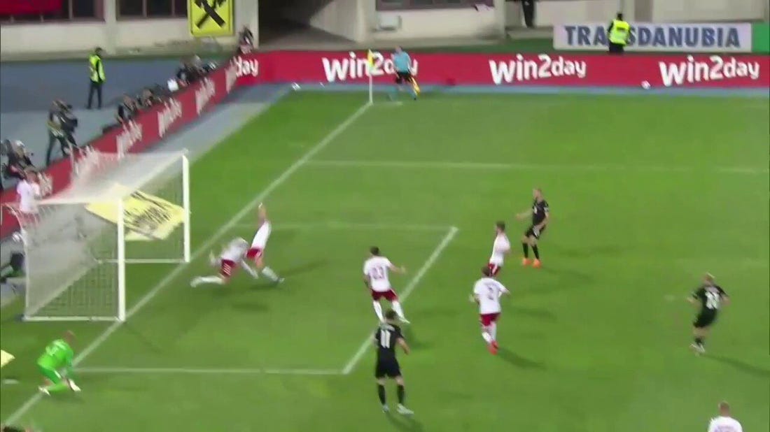 Xaver Schlager ties the game for Austria after Denmark's turnover