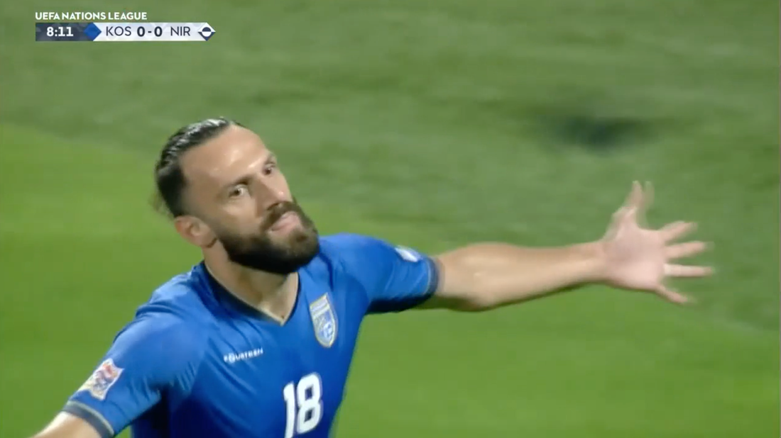 Vedat Muriqi smashes in a penalty kick to give Kosovo the first goal vs. Northern Ireland